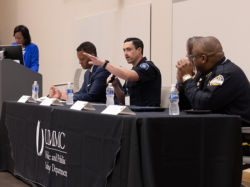 UMMC Deputy Police Chief Joshua Bromen speaks at the 30x30 Initiative conference hosted by UMMC March 16-17. Also seated are Tony Alves, HR director at Memorial Hospital Gulfport and former Gulfport police officer, left, April Thompson, recruitment officer with Gulfport Police Department and Joseph Daughtry, Columbus chief of police. Moderating the panel is Dr. Juanyce Taylor, UMMC chief diversity and inclusion officer.